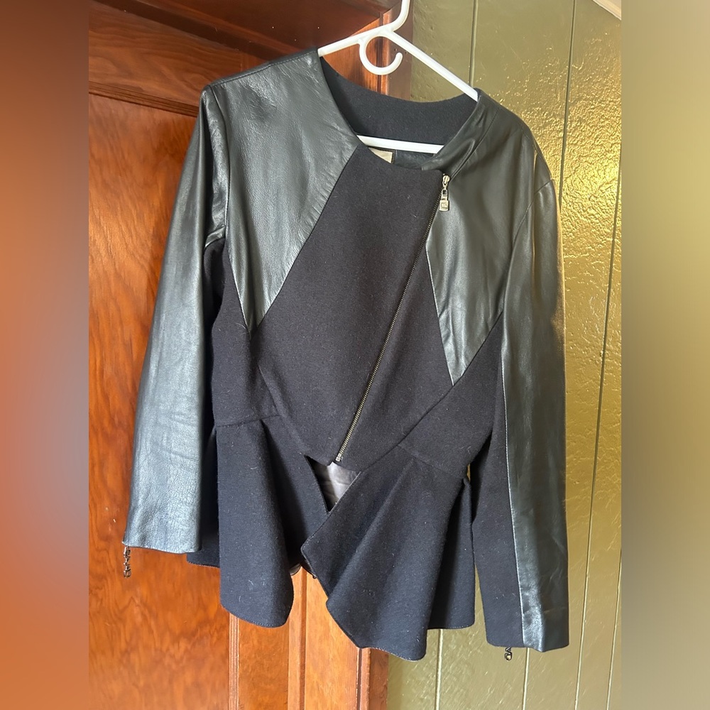 Black mixed material leather jacket.
